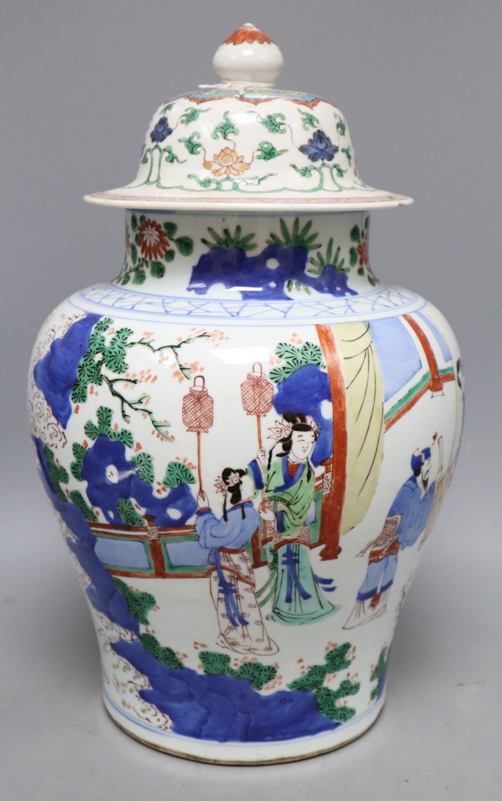 A Chinese Wucai jar and associated cover, height excluding cover 32cm